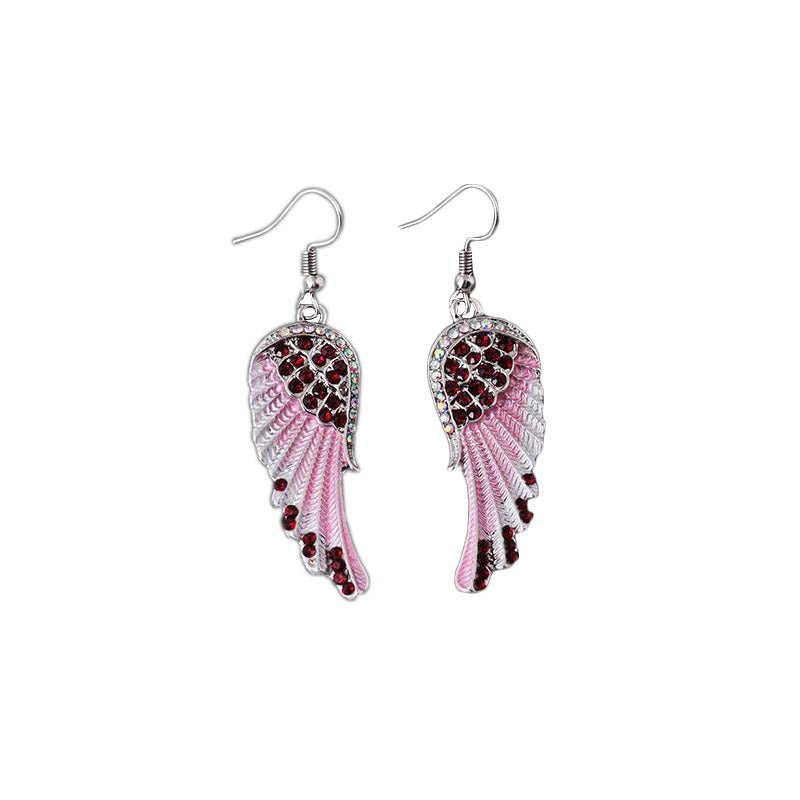 Boucles d'oreilles en ailes d'ange avec diamants - Allomarc.com