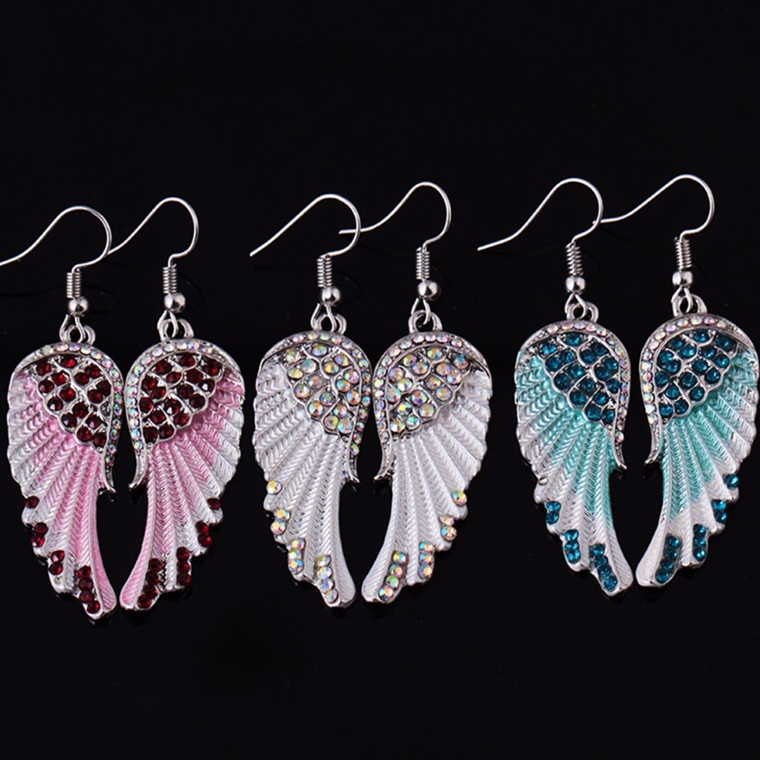 Boucles d'oreilles en ailes d'ange avec diamants - Allomarc.com