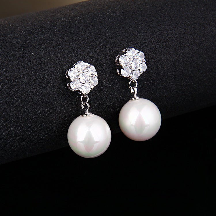 Boucles d'oreilles longues en perles rondes - Allomarc.com